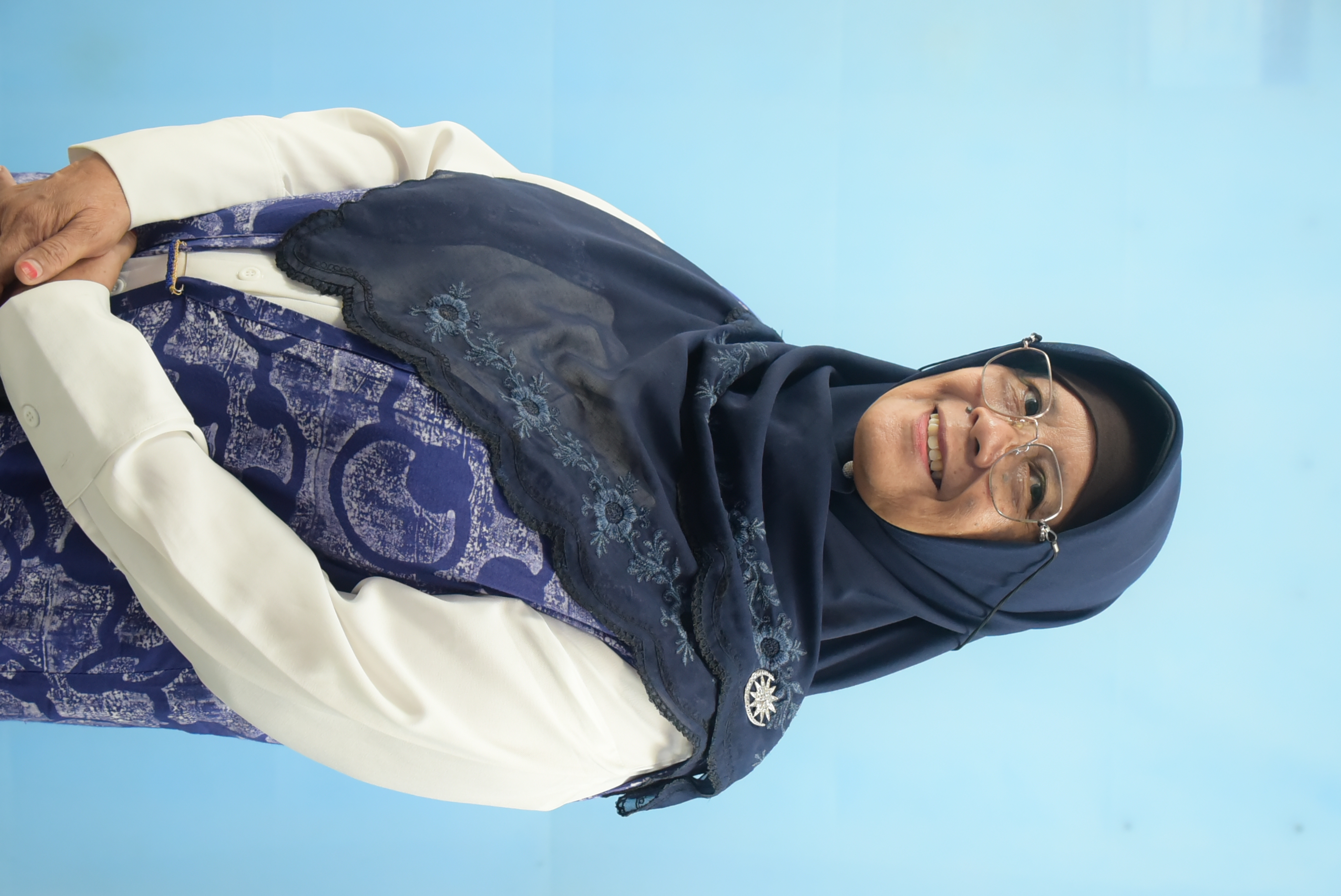 Yusnizar Heniwaty, Section Editor